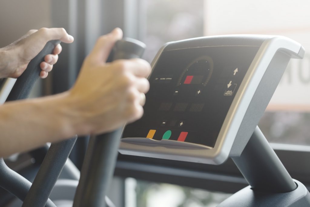 Coach playing cardio training exercises
